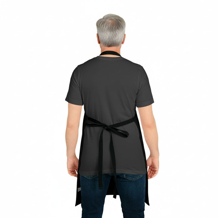 Person wearing a black apron on a white background