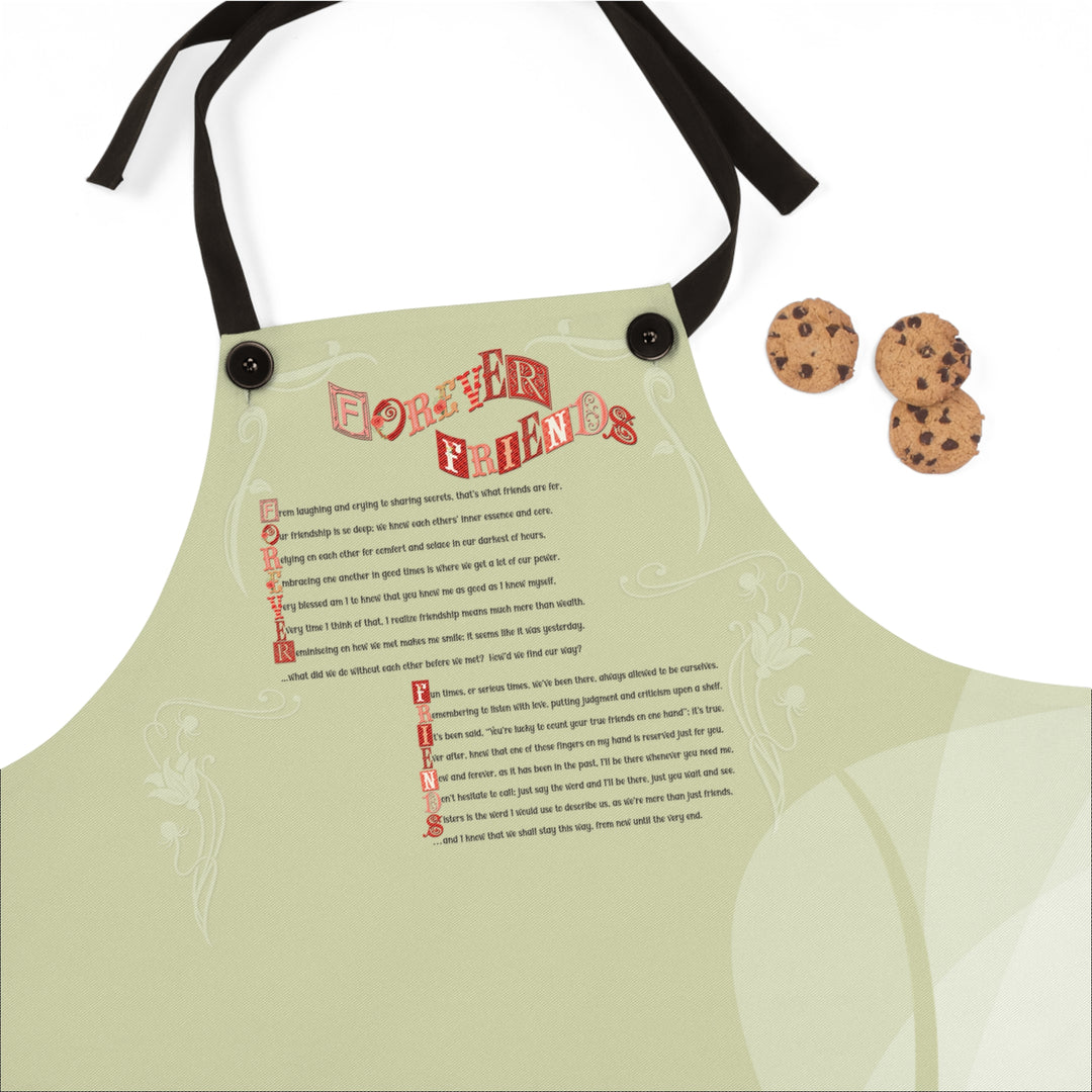 Light green apron with text and cookie design on a white background