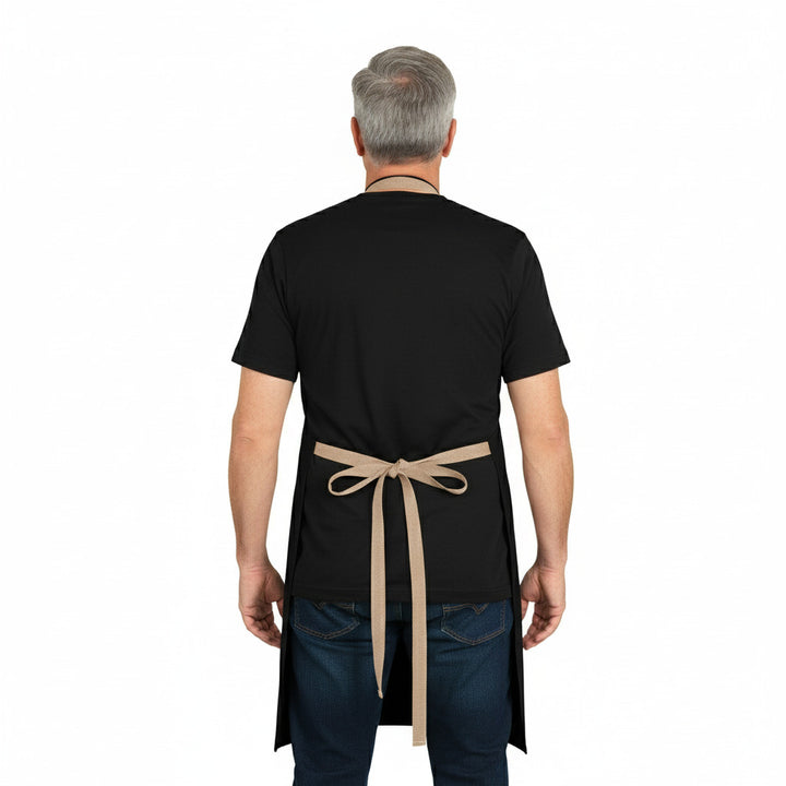 Man wearing a black apron with a beige strap on a white background